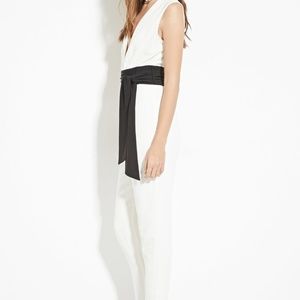 Brand NEW white jumpsuit with black belt